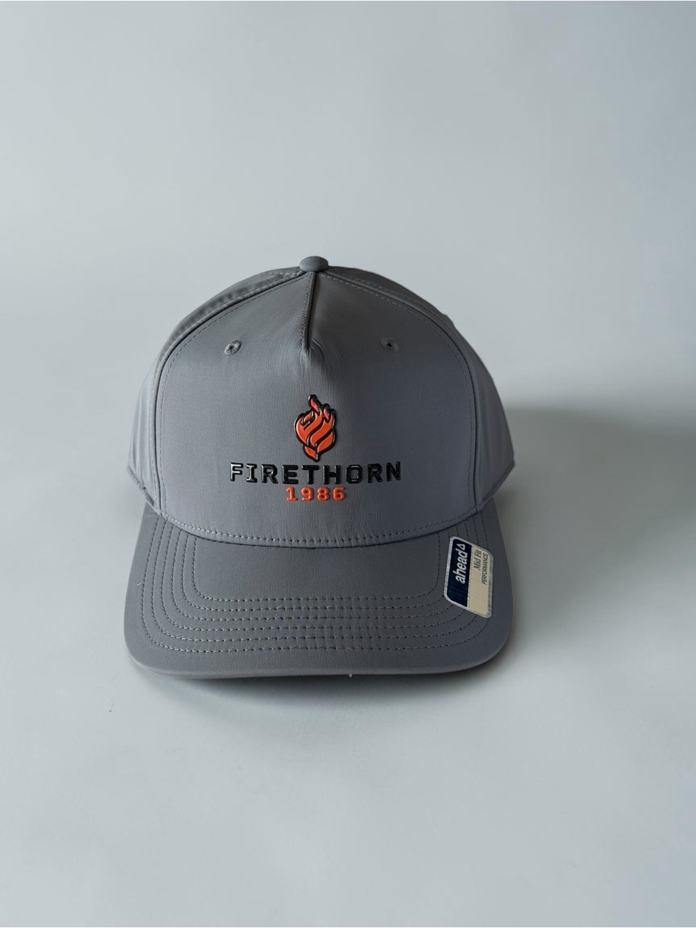 Firethorn Kids Grey Baseball Hat with Orange Flame Logo